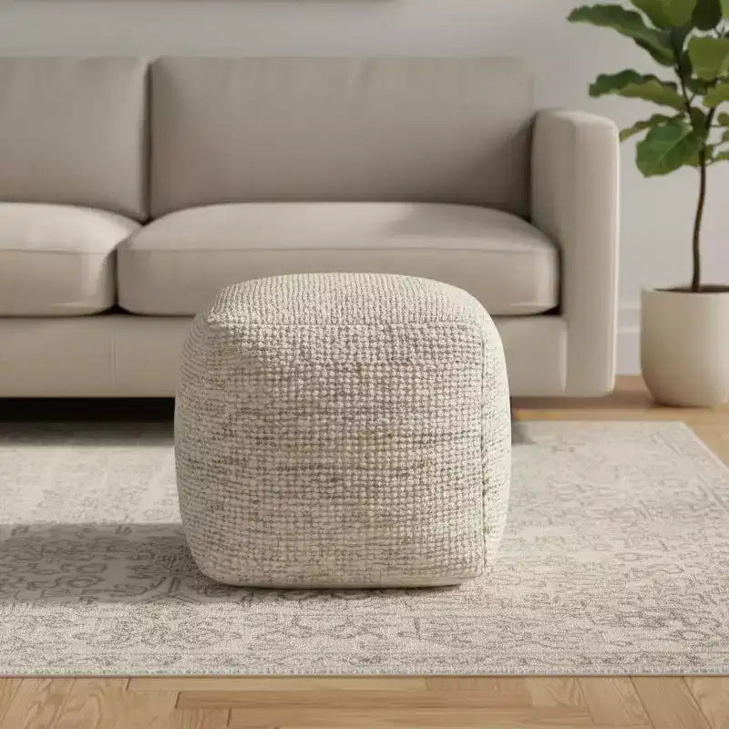Pouf ottoman rayé en coton, laine et jute
